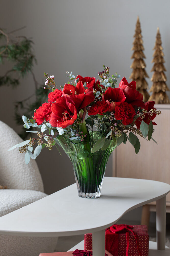Vase med amaryllisbukett